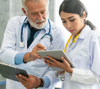 male and female doctors reviewing charts